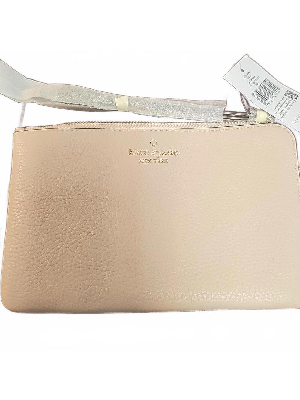 Kate spade wristlet. Pebble Oatmeal Colored Leather